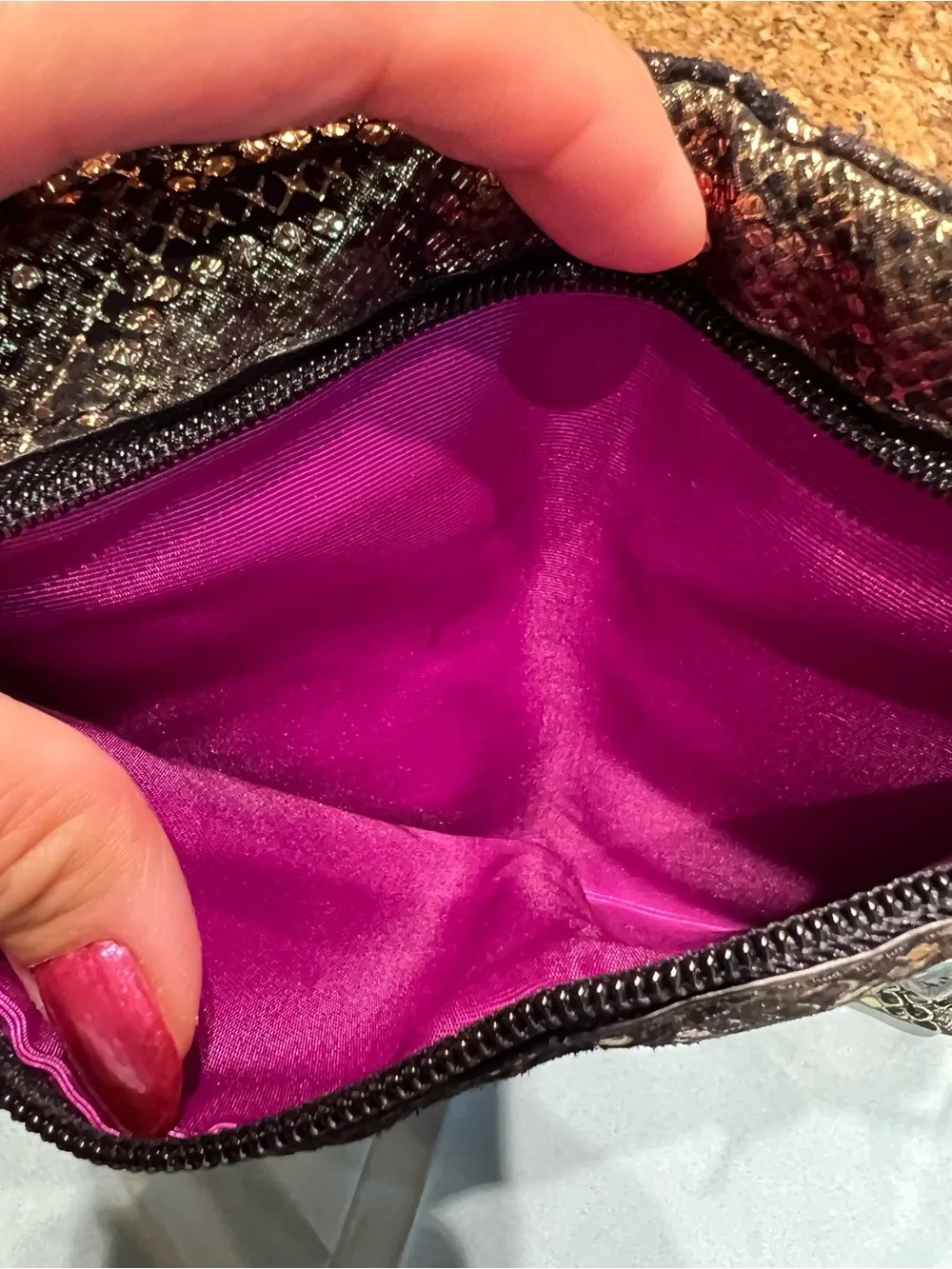HOBO Iridescent Snake-Embossed Clutch in Brown and Black